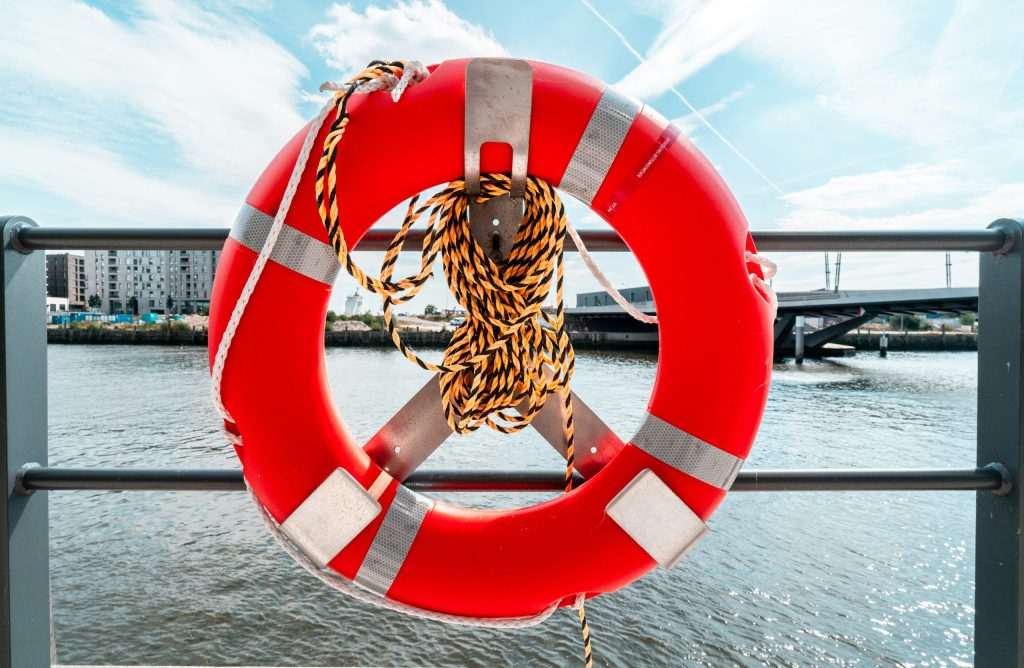 Boat ramp safety ring on display at boat ramp.